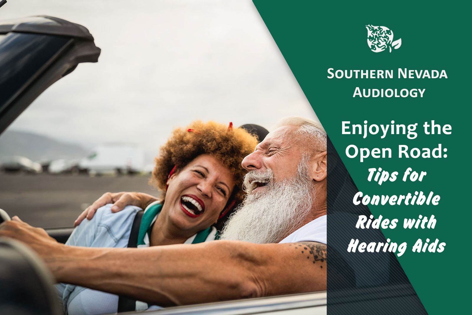 senior couple enjoying a convertible car ride